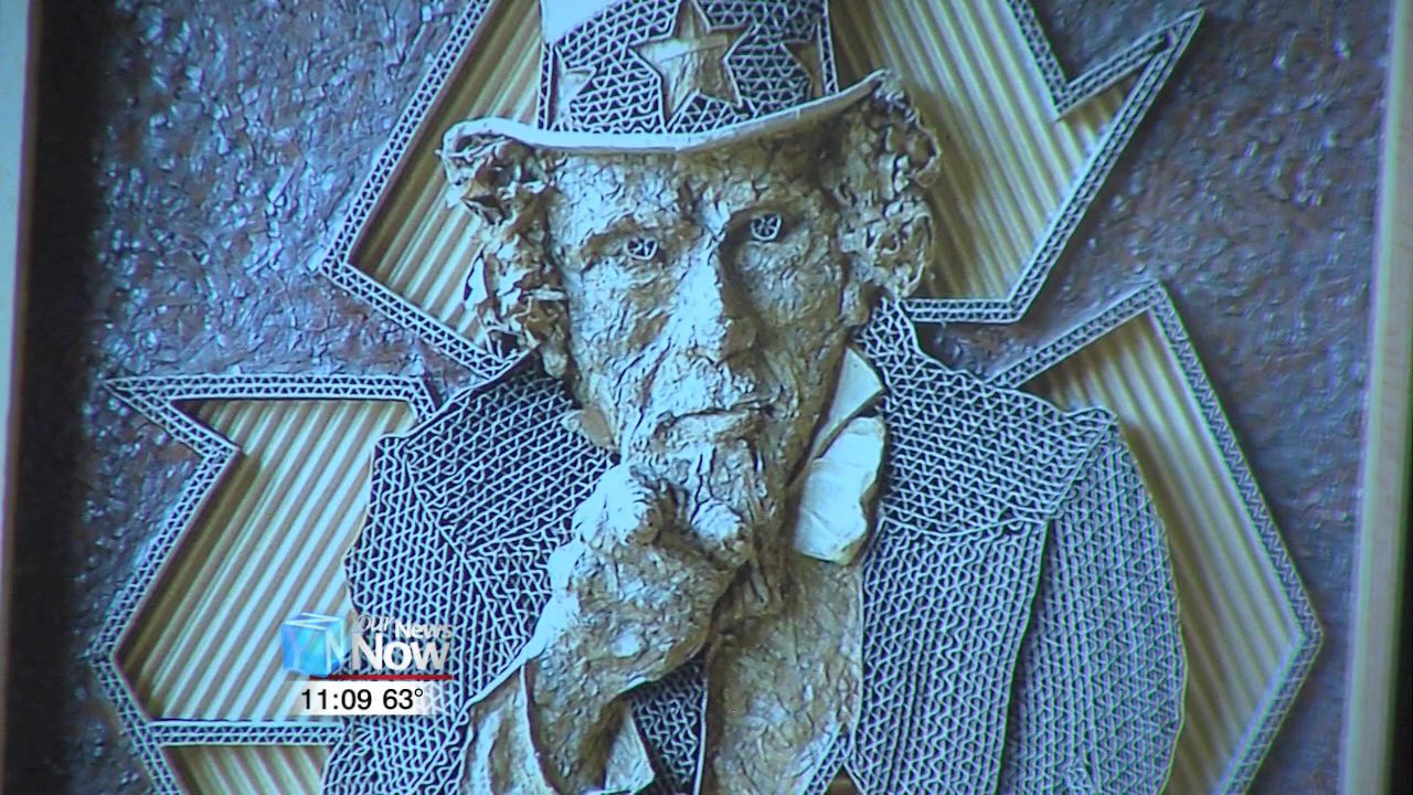 Cardboard artist showcases artwork at Riverside Art Centers.jpg